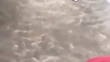 MILF dries hair and body outdoors being filmed by an Indian perv