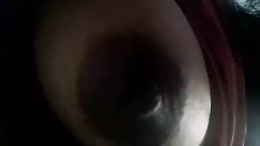 Indian diva lies on back and brings her XXX dark nipples to light