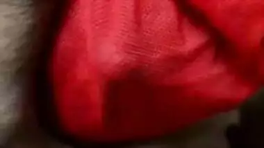 Playing with the hot boobs of aunty in red bikini