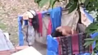 Indian girl bathing outdoor
